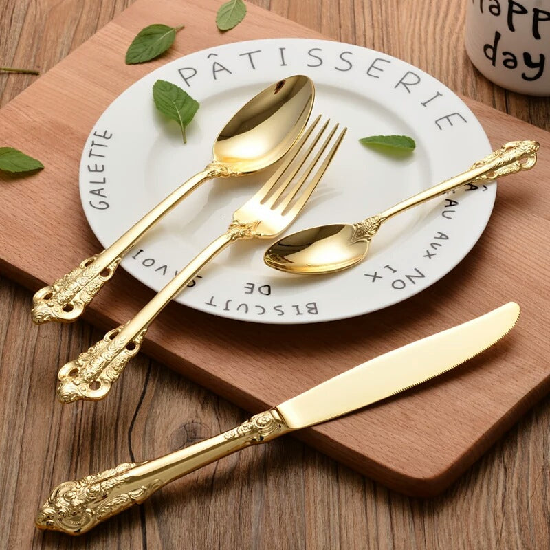 https://my-posh-kitchen.myshopify.com/cdn/shop/products/Retro-Vintage-Western-Gold-Plated-Relief-Cutlery-Dining-Knives-Forks-Teaspoon-Set-Golden-Luxury-Dinnerware-Tableware_75c22fb4-dbcc-4490-adc9-5d3fe181e8b2.jpg?v=1513236105